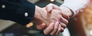 employee promise handshake